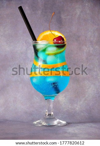 Imagine de stoc: Close Up View Of Blue Lagoon Cocktails With Ice Cubes On White
