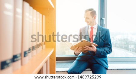 ストックフォト: Attorney At Law In The Library Of His Office Reading And Thinking