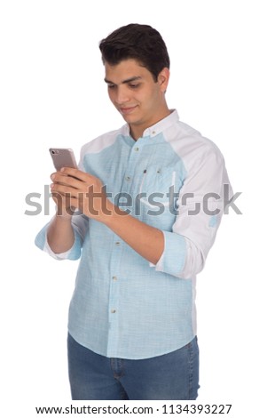 Foto stock: Young Smiley Man Speaking On His Mobile Isolated On White Copy