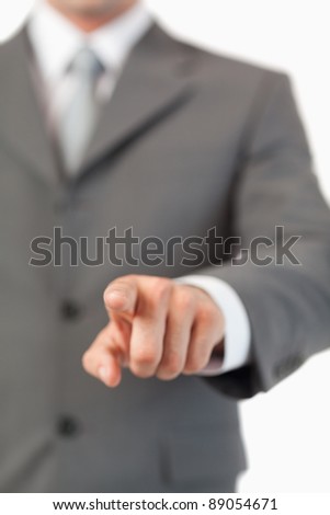 Stok fotoğraf: Close Up Of Masculine Finger Pressing A Invisible Touchscreen Against A White Background