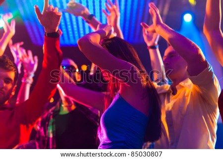 People Dancing In Disco Club Lightshow Stockfoto © Kzenon
