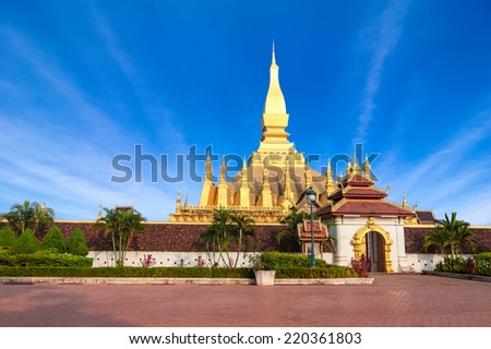 Stock photo: Buddhist Pagoda Of Phra That Luang Temple Under Blue Sky Vientiane Laos