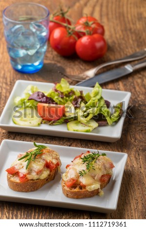 Сток-фото: Homemade Fresh Figs Salad With Herbs And Roasted Garlic Toast