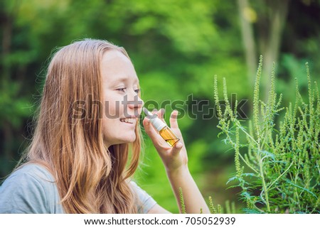 Stock photo: Young Woman Uses A Spray From An Allergy Because Of An Allergy To Ragweed