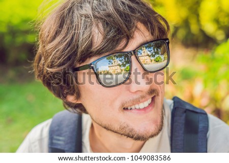 Сток-фото: Male Tourist Looking At Wat Chalong Is The Most Important Temple Of Phuket