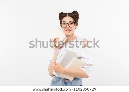 Stock foto: Photo Of European School Girl With Dental Braces Holding Copyspa