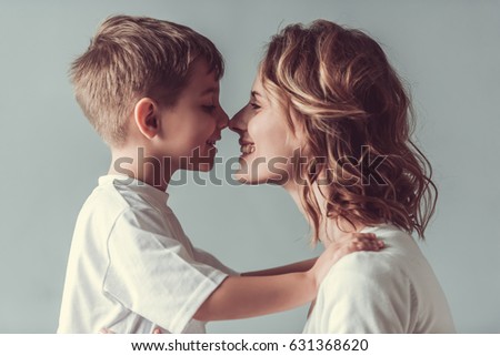 [[stock_photo]]: Loving Parents Cuddling Little Son