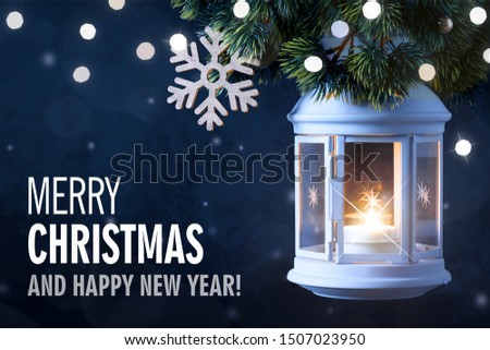 Stok fotoğraf: Snowy Blue Lantern And Christmas Balls On The Background Of Fir