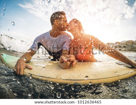 Stockfoto: Couple In Love Having Romantic Tender Moments At Sunset On The Beach