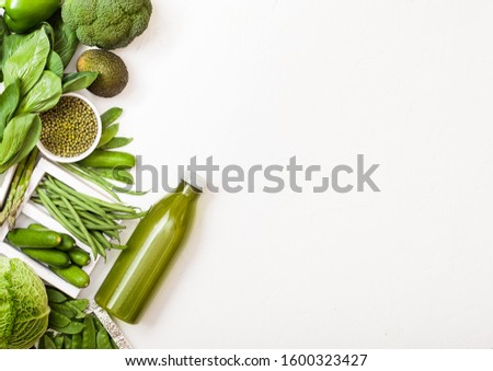 ストックフォト: Assorted Green Toned Raw Organic Vegetables On White Stone Background Avocado Cabbage Broccoli C