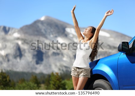 Stockfoto: Summer Car Travel Freedom Woman In Yosemite National Park With Arms Raised Up Cheerful And Happy Su