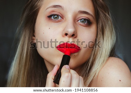 Stok fotoğraf: Close Up Portrait Model Applying Dark Red Lipstick Professional Fashion Retro Makeup Cosmetics Ma