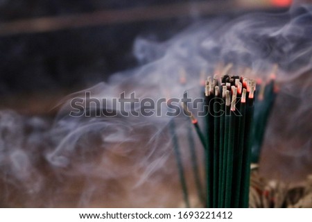 Stockfoto: Candles And Aroma Incense Sticks For Religion Offering Ceremony In Buddhist Temple