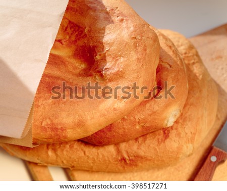 Stock photo: Several Armenian Homemade Bread Mantakash In A Paper Bag