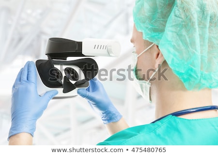 Stock photo: Doctor Working With Virtual Vr Reality Glasses