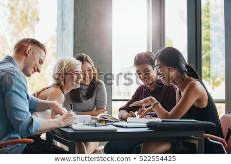 Stock photo: Young People At School Students Studying In College Library