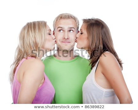 Two Girls Kissing Handsome Young Boy [[stock_photo]] © courtyardpix