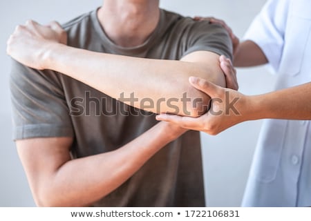 Stock photo: Patient At The Physiotherapy Doing Physical Therapy