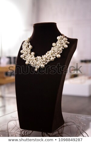 Stock fotó: Pearl Necklace On Black Mannequin Isolated