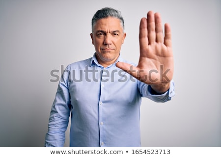 Stock photo: Senior Man Stopping With Hand Gesture