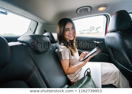 Foto stock: Pretty Lady Riding In A Limousine