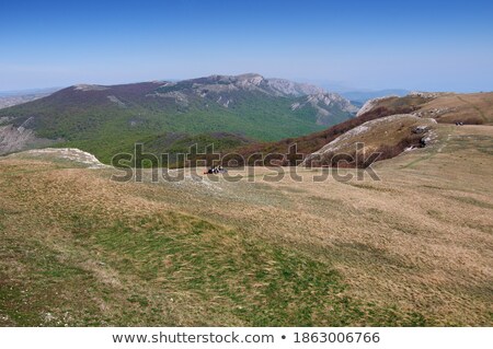 Foto stock: Beautiful Daylight View To Blue Sea And Green Mountains