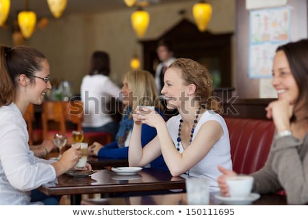 Сток-фото: Women Having A Break In A Coffee House
