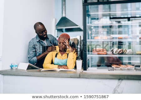 Imagine de stoc: Man Consoling Work Colleague