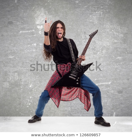 Foto stock: Band Playing On Stage Making Music