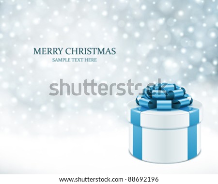 Stock foto: Winter Holiday Gift Box With Blue Silk Bow Snow Glitter On Marb