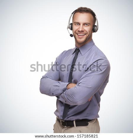 Smiling Young Man With Telephone Headset Isolated On White Backg Foto d'archivio © doodko