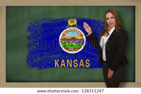 Teacher Showing Flag Ofkansas On Blackboard For Presentation Mar [[stock_photo]] © vepar5