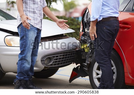 Stock fotó: Two Men Arguing After A Car Accident Traffic Collision On The Ro