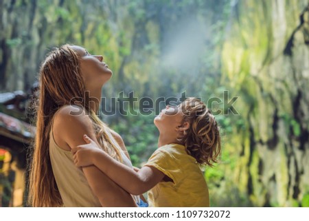 Zdjęcia stock: Mom And Son In The Background Of Batu Caves Near Kuala Lumpur Malaysia Traveling With Children Co