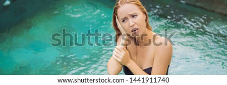 Сток-фото: Woman Has An Ear Ache In The Pool Diver Ear Banner Long Format