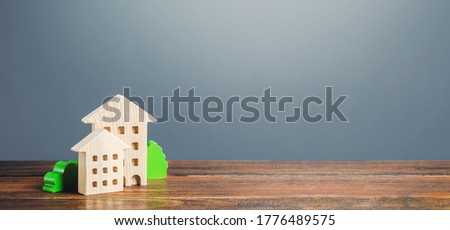 Zdjęcia stock: Figures Of Residential Buildings On A Gray Background Buy Purchase And Sale Housing Rental Commun