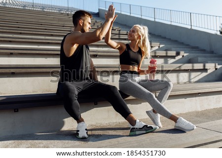 Stock fotó: Athletic Man And Woman After Fitness Exercise With The Chemical