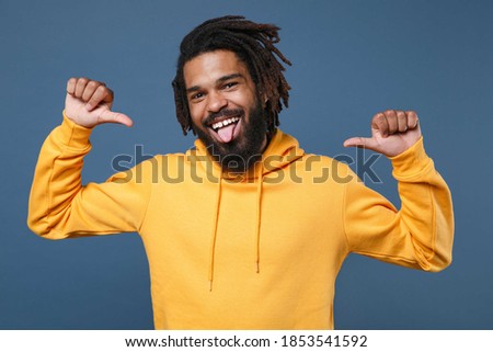 Stock photo: Image Of Funny African American Guy In Hoodie Sticking Out His T