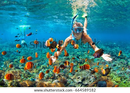 Foto d'archivio: Happy Man In Snorkeling Mask Dive Underwater With Tropical Fishes In Coral Reef Sea Pool Travel Lif