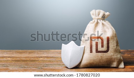 Zdjęcia stock: Israeli Shekel Money Bag And Protection Shield Ease Doing Business Guaranteed Deposits Insurance C