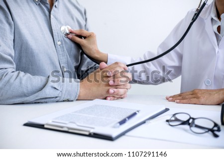 Female Doctor Checking Heart Beat Of Patient And Recommend Treat Сток-фото © Freedomz