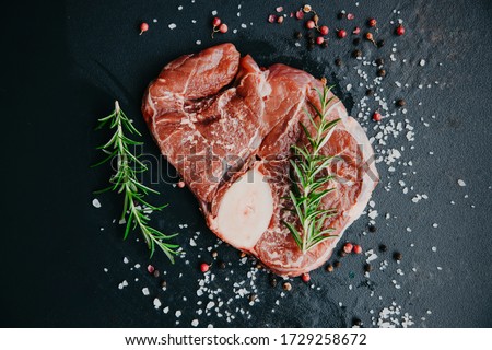 Foto stock: Raw Beef Steak With Spices And Ingredients For Cooking Top View Copy Space