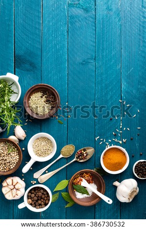 Foto d'archivio: Rosemary Garlic Salt And White Pepper Culinary Background With Various Spices Directly Above Fl