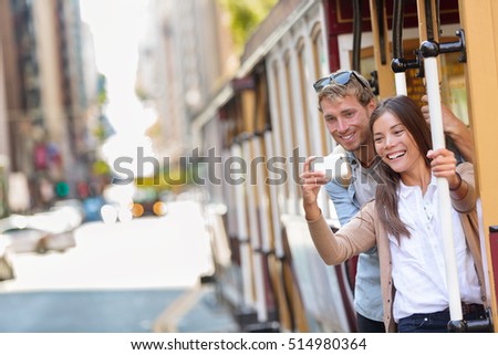 ストックフォト: San Francisco Cable Car Tram People Tourists Taking The Popular Tourist Attraction Tramway Of The Po