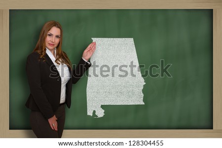 Teacher Showing Map Of Alabama On Blackboard [[stock_photo]] © vepar5