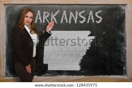 Teacher Showing Map Of Arkansas On Blackboard [[stock_photo]] © vepar5