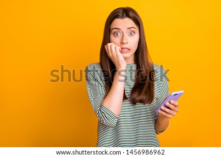 Stock photo: Worried Woman With Smartphone