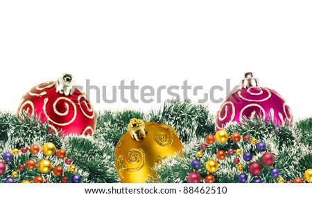 Foto d'archivio: Colorful Christmas Balls Among Green New Year Tree Over White