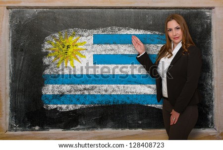 Teacher Showing Flag Ofuruguay On Blackboard For Presentation Ma [[stock_photo]] © vepar5