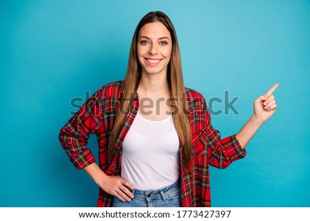 Foto stock: Young Pretty Long Haired Girl In Checkered Shirt Showing Thumb U